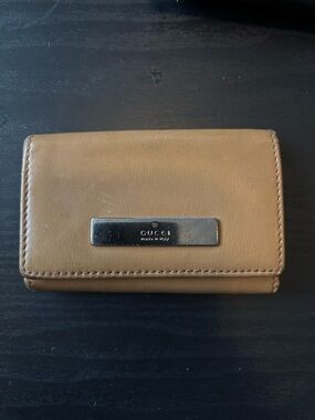 Gucci Tan Leather Fold Wallet with Metal Logo Plaque
